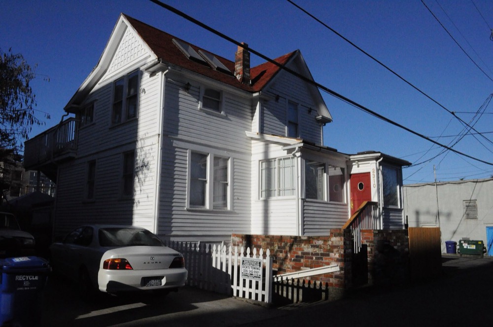 A house fronting onto a platted public alley in Seattle's Admiral District in West Seattle.