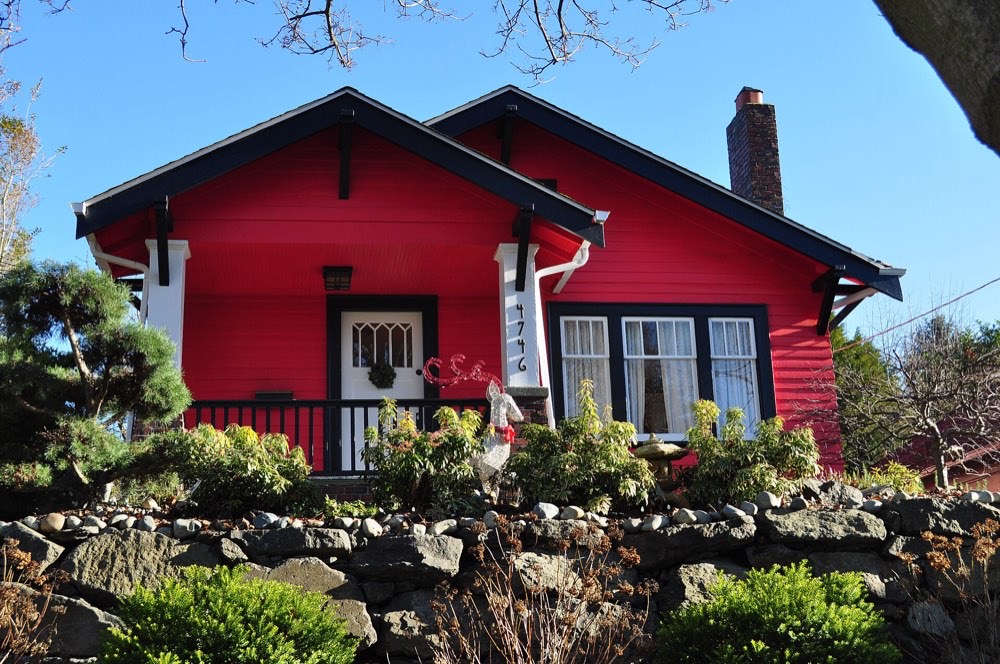 A red American Craftsman bungalow at a house in Seattle's Wallingford neighborhood.