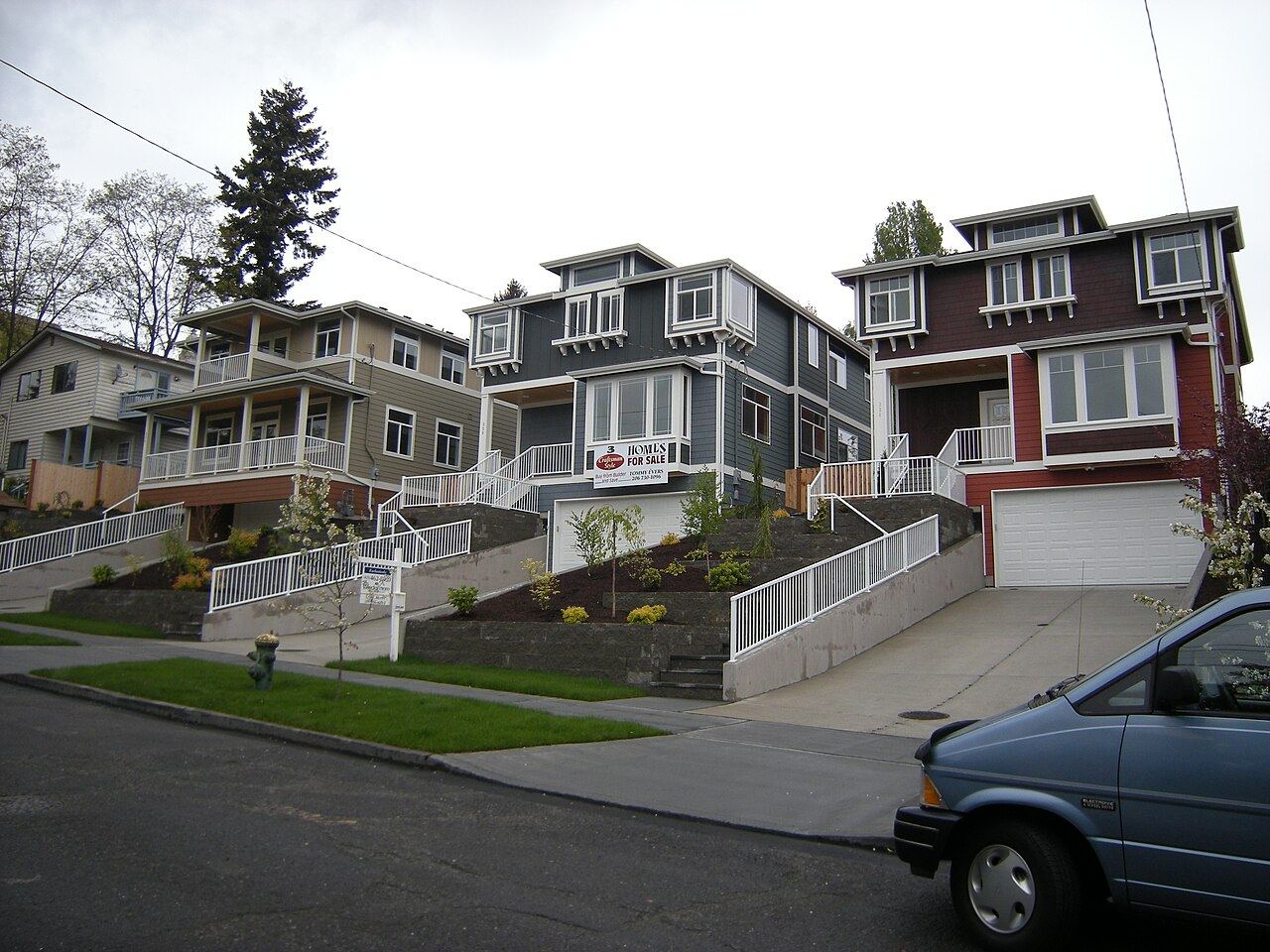 Recently constructed Craftsman-style houses in Seattle's Squire Park neighborhood.