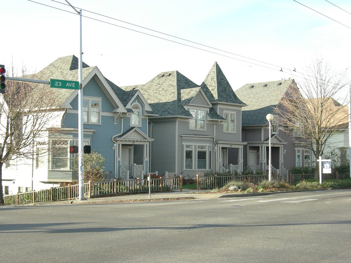 A row of restored landmark houses at the corner of 23rd and Yesler in Seattle's Central District.