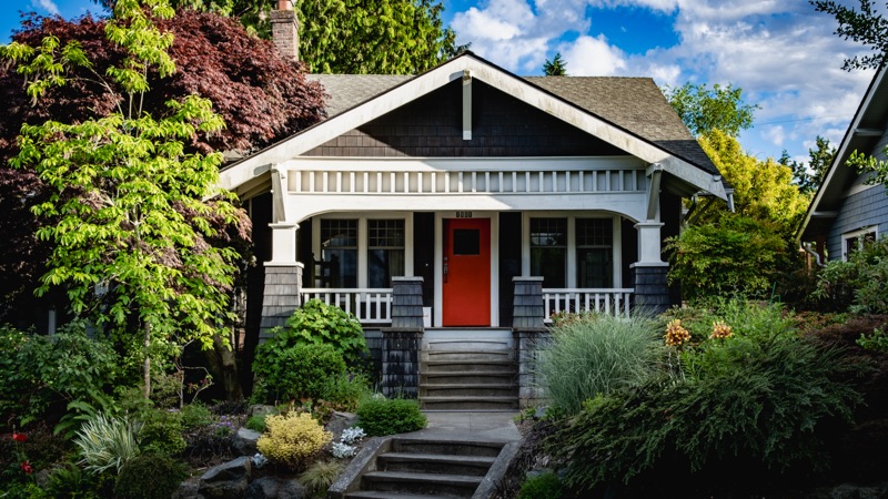 An American Craftsman home at a house in Seattle's Ravenna neighborhood — a single-family house of the type a DADU joins rather than replaces.