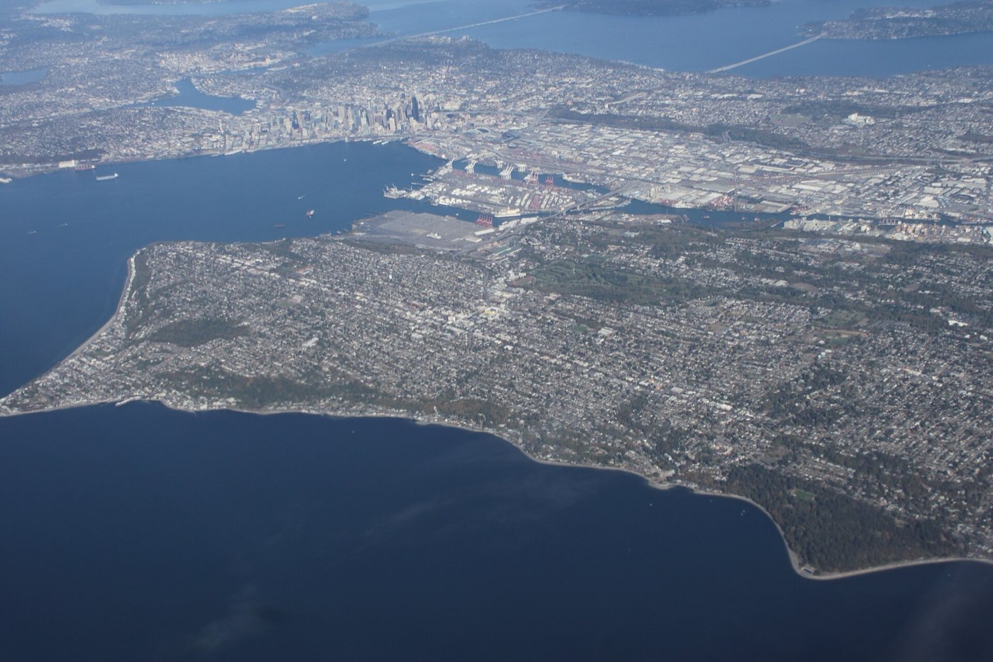 Aerial view of residential lots and streets in West Seattle, showing how closely Seattle houses are packed onto their parcels.